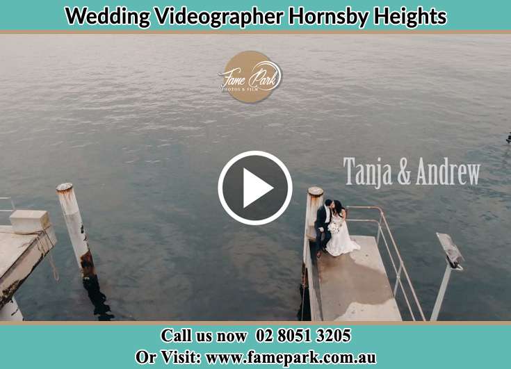 The newlyweds kissing near the shore Hornsby Heights NSW 2077